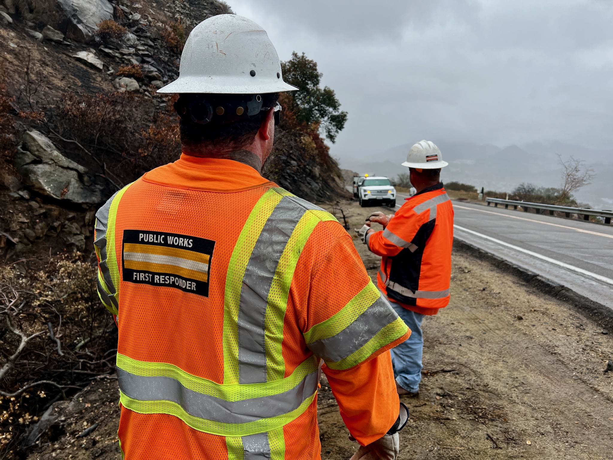 Crews working on rainy roads